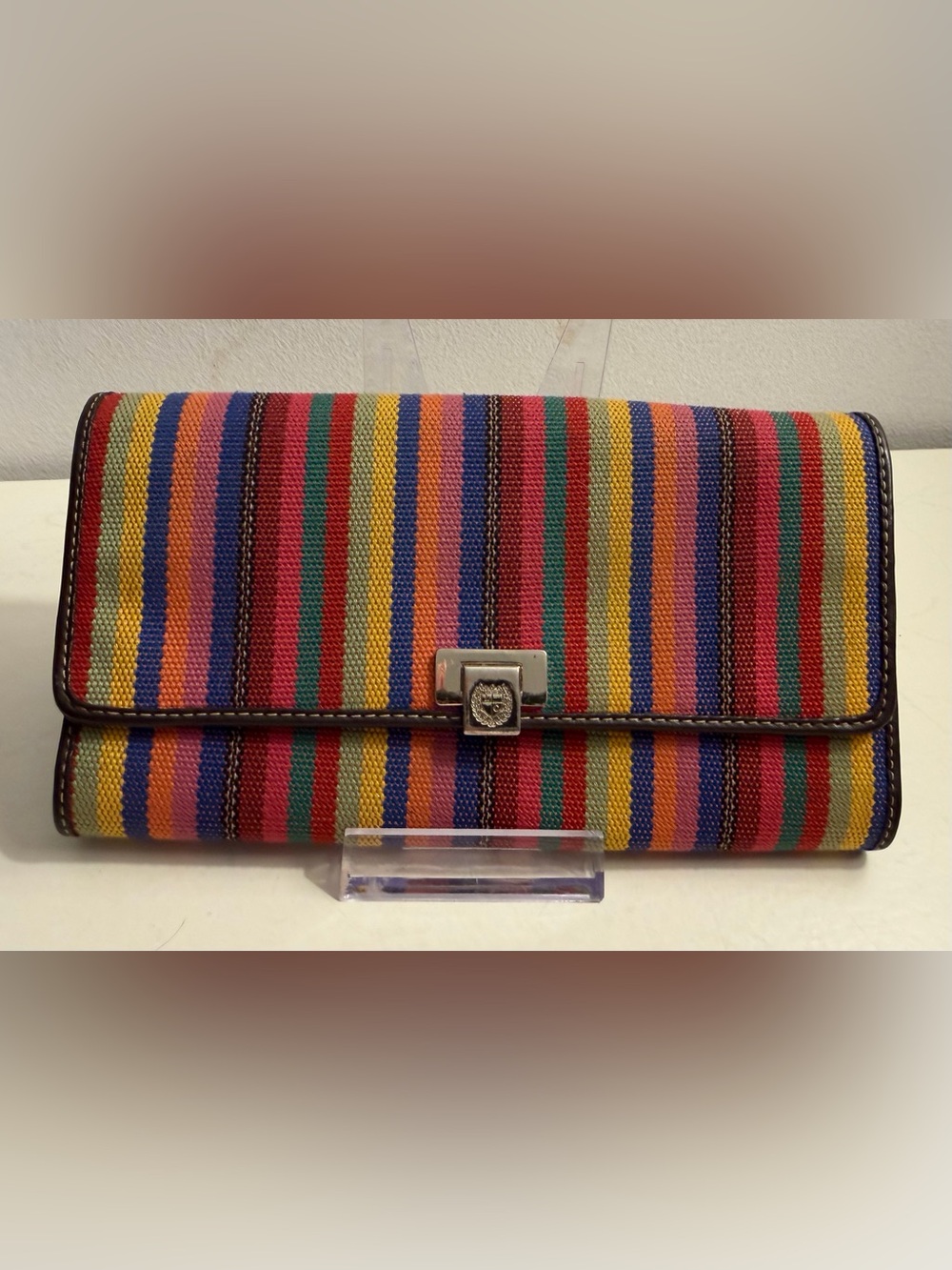 Liz Claiborne striped tri-fold wallet.